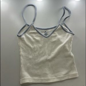 white brandy melville tank top with blue straps!!